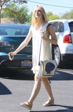 ELLE FANNING Out and About in Hollywood 10/08/2015