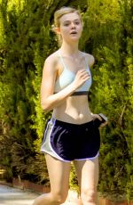 ELLE FANNING Out Jogging in Studio City 10/02/2015