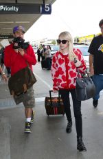 EMMA ROBERTS Arrives at Los Angeles Internatiobal Airport 10/19/2015
