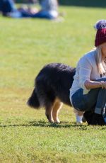 HILARY DUFF Playing with Dogs at a Park in New York 10/11/2015