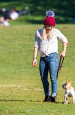HILARY DUFF Playing with Dogs at a Park in New York 10/11/2015