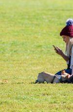 HILARY DUFF Playing with Dogs at a Park in New York 10/11/2015