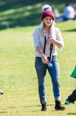 HILARY DUFF Playing with Dogs at a Park in New York 10/11/2015