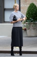 KELLY RUTHERFORD Hails a Cab in New York 10/14/2015