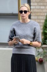 KELLY RUTHERFORD Hails a Cab in New York 10/14/2015