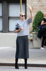 KELLY RUTHERFORD Hails a Cab in New York 10/14/2015