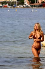 KIMBERLEY GARNER in Bikini at a Beach in St. Tropez