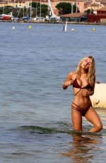 KIMBERLEY GARNER in Bikini at a Beach in St. Tropez