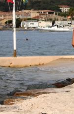 KIMBERLEY GARNER in Bikini at a Beach in St. Tropez