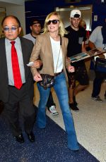 KIRSTEN DUNST Arrives at LAX Airport in Los Angeles 10/14/2015