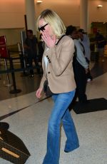 KIRSTEN DUNST Arrives at LAX Airport in Los Angeles 10/14/2015
