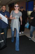 KIRSTEN DUNST in Jeans at LAX Airport 10/17/2015