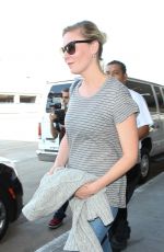 KIRSTEN DUNST in Jeans at LAX Airport 10/17/2015