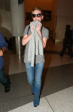KIRSTEN DUNST in Jeans at LAX Airport 10/17/2015