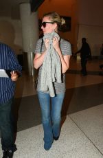 KIRSTEN DUNST in Jeans at LAX Airport 10/17/2015