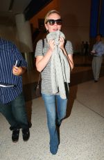 KIRSTEN DUNST in Jeans at LAX Airport 10/17/2015