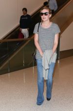 KIRSTEN DUNST in Jeans at LAX Airport 10/17/2015