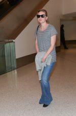 KIRSTEN DUNST in Jeans at LAX Airport 10/17/2015