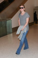 KIRSTEN DUNST in Jeans at LAX Airport 10/17/2015