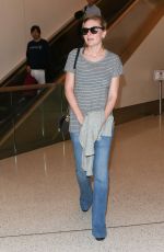 KIRSTEN DUNST in Jeans at LAX Airport 10/17/2015