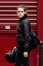 KRISTEN STEWART Riding a Bike on the Set of Personal Shopper in Paris 10/28/2015