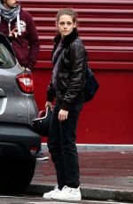 KRISTEN STEWART Riding a Bike on the Set of Personal Shopper in Paris 10/28/2015