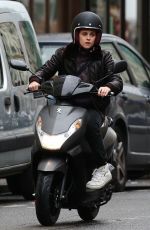 KRISTEN STEWART Riding a Bike on the Set of Personal Shopper in Paris 10/28/2015