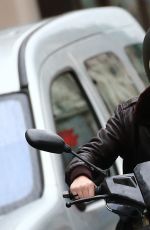 KRISTEN STEWART Riding a Bike on the Set of Personal Shopper in Paris 10/28/2015