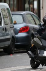 KRISTEN STEWART Riding a Bike on the Set of Personal Shopper in Paris 10/28/2015
