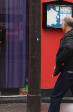 KRISTEN STEWART Riding a Bike on the Set of Personal Shopper in Paris 10/28/2015