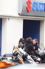 KRISTEN STEWART Riding a Bike on the Set of Personal Shopper in Paris 10/28/2015