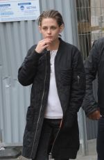 KRISTEN STEWART Riding a Bike on the Set of Personal Shopper in Paris 10/28/2015