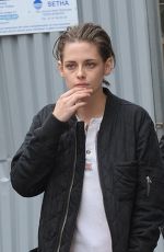 KRISTEN STEWART Riding a Bike on the Set of Personal Shopper in Paris 10/28/2015