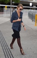 LARA BINGLE Arrives at Airport in Melbourne 10/16/2015