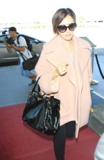 LILY COLLINS Arrives at Los Angeles International Airport 10/09/2015