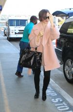 LILY COLLINS Arrives at Los Angeles International Airport 10/09/2015