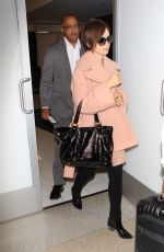LILY COLLINS Arrives at Los Angeles International Airport 10/09/2015