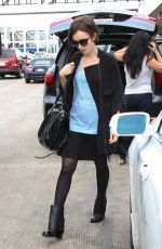 LILY COLLINS Arrives at Los Angeles International Airport 10/16/2015