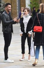 LILY COLLINS Arrives at Saatchi Gallery in London 10/12/2015