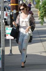 LILY COLLINS in Ripped Jeans Out and About in West Hollywood 10/21/2015