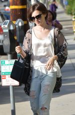 LILY COLLINS in Ripped Jeans Out and About in West Hollywood 10/21/2015
