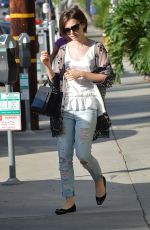 LILY COLLINS in Ripped Jeans Out and About in West Hollywood 10/21/2015