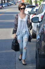 LILY COLLINS in Ripped Jeans Out and About in West Hollywood 10/21/2015