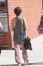 LILY COLLINS Out Shopping in Beverly Hills 09/30/2015