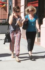 LILY COLLINS Out Shopping in Beverly Hills 09/30/2015