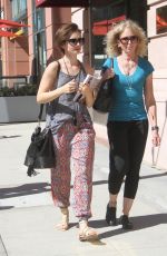 LILY COLLINS Out Shopping in Beverly Hills 09/30/2015