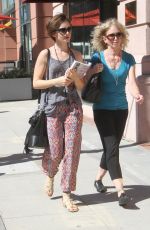LILY COLLINS Out Shopping in Beverly Hills 09/30/2015