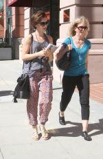 LILY COLLINS Out Shopping in Beverly Hills 09/30/2015