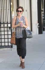 LILY COLLINS Out Shopping in Beverly Hills 10/01/2015