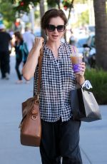 LILY COLLINS Out Shopping in Beverly Hills 10/01/2015